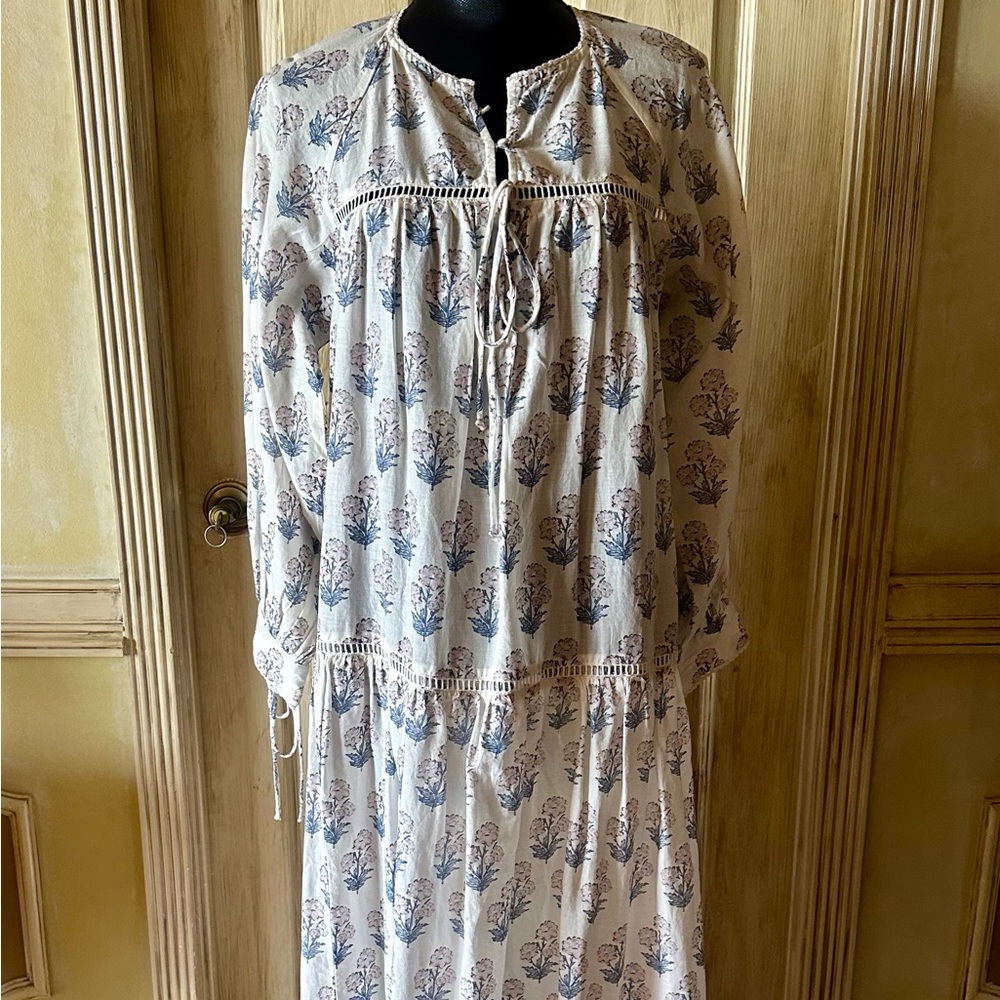 The dress is new, just without a label. The fabric is light and pleasant to wear